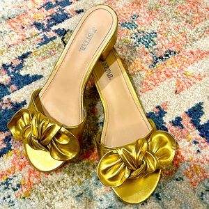JUSTFAB golden bow slip on sandal